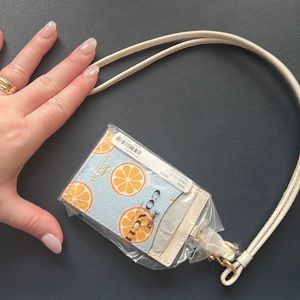 Coach orange slice lanyard new